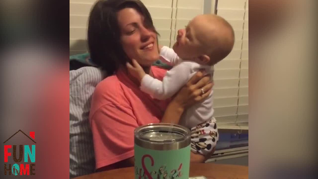 Baby kissing his mom
