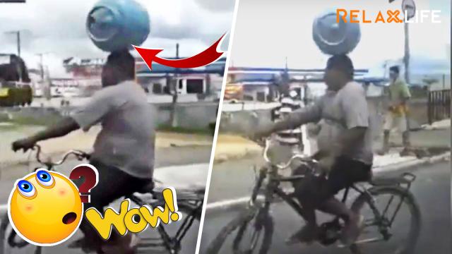 The fuel-gas cylinder is put on a brave man's head